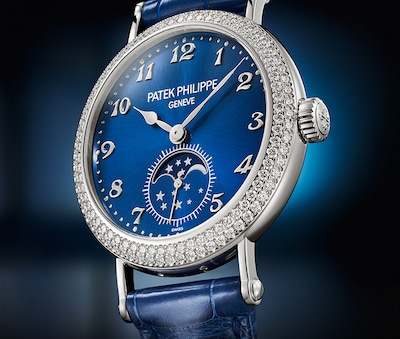 Patek Philippe Watch with Logo and text Discover More image